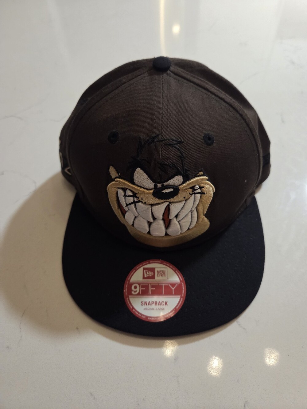 New Era 9FIFTY Taz Tasmanian snapback hat featuring a large embroidered Taz